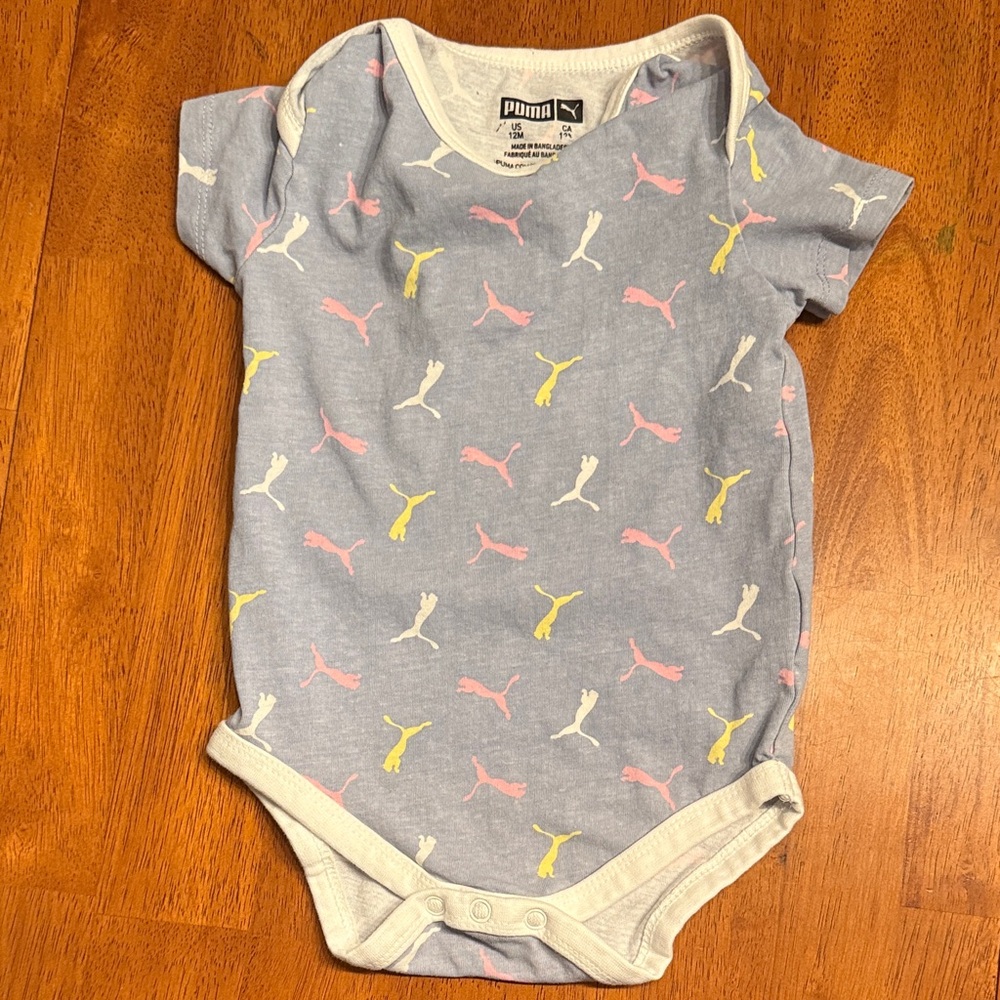 Puma Baby Bodysuit in Soft Blue with Pink and Yellow Accents